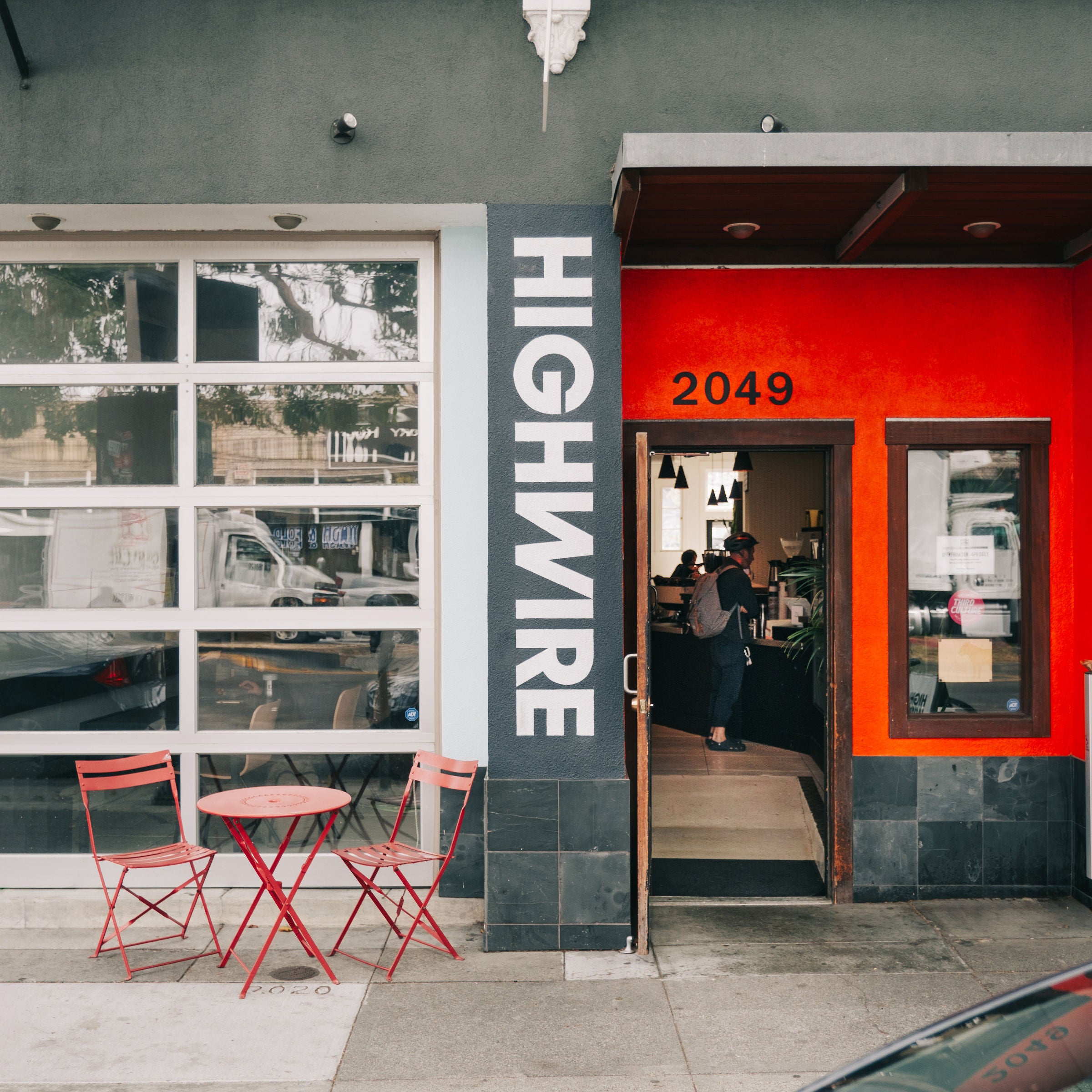 Storefront of Highwire's coffee shop in San Pablo with outdoor seating